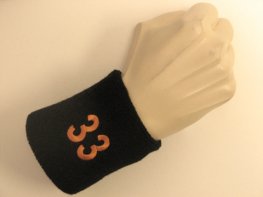 Black wristband sweatband with number 33