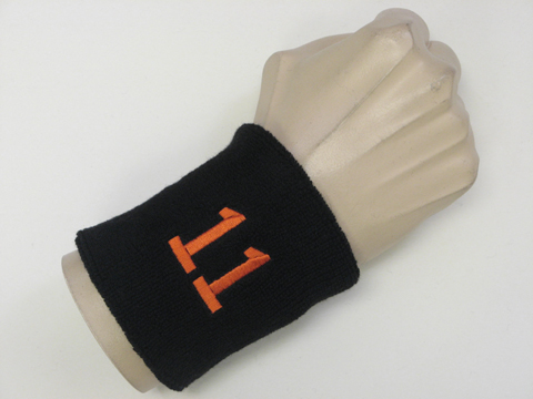 Black wristband sweatband with number 11 eleven
